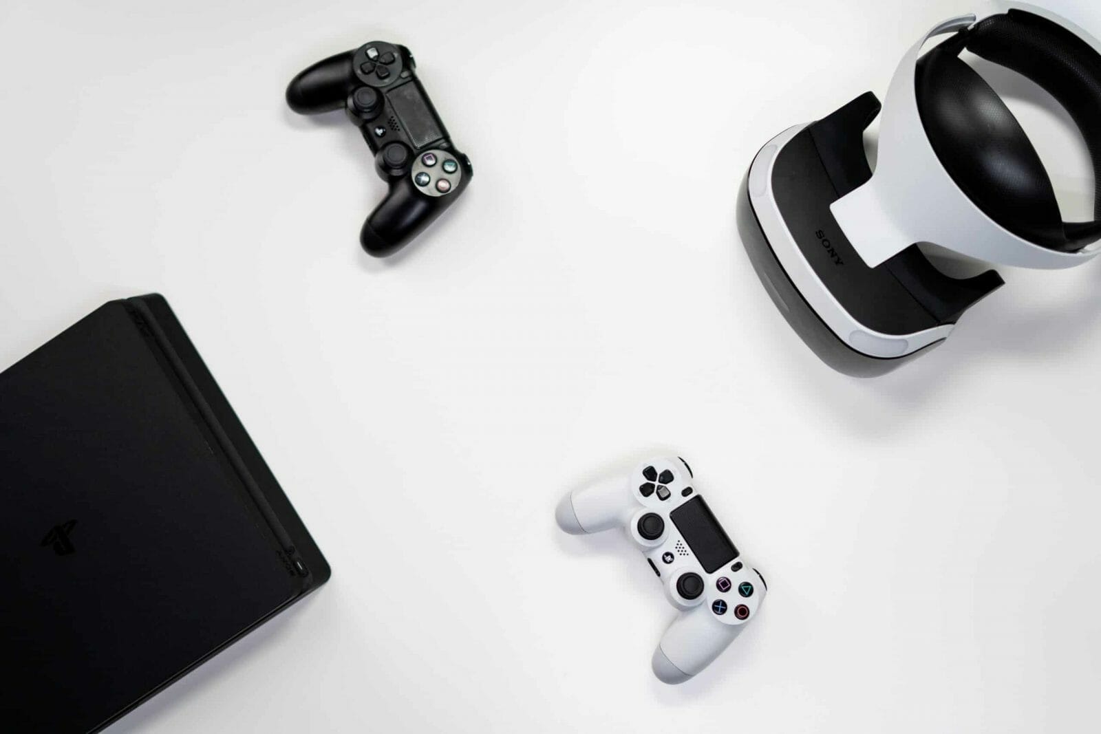 An image showing a Console alongside controllers and a VR headset