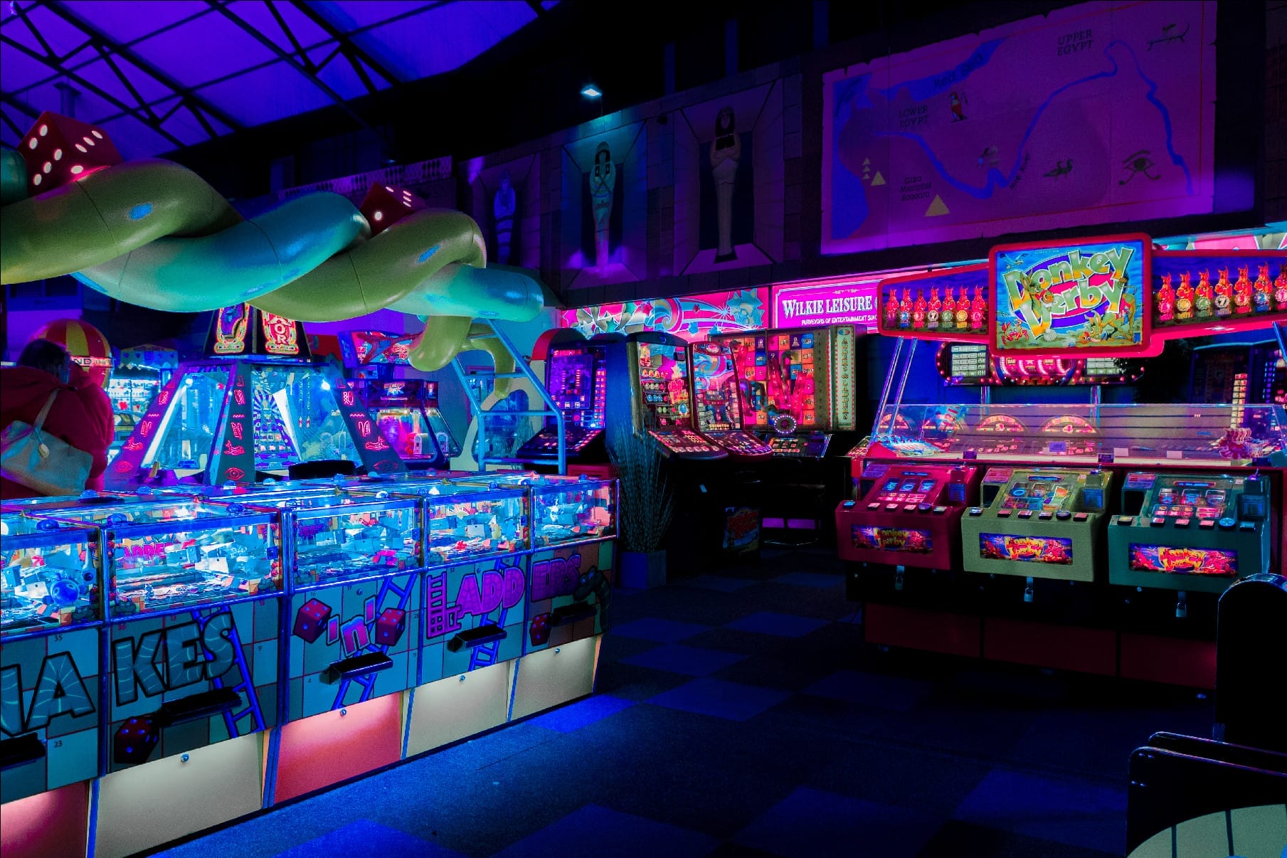 Empty neon-lit arcade